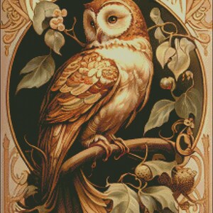 May include: A brown and white owl perched on a branch with green leaves and brown seed pods. The owl is surrounded by a decorative frame with the word "ODIOCOOLIM" written in gold lettering.
