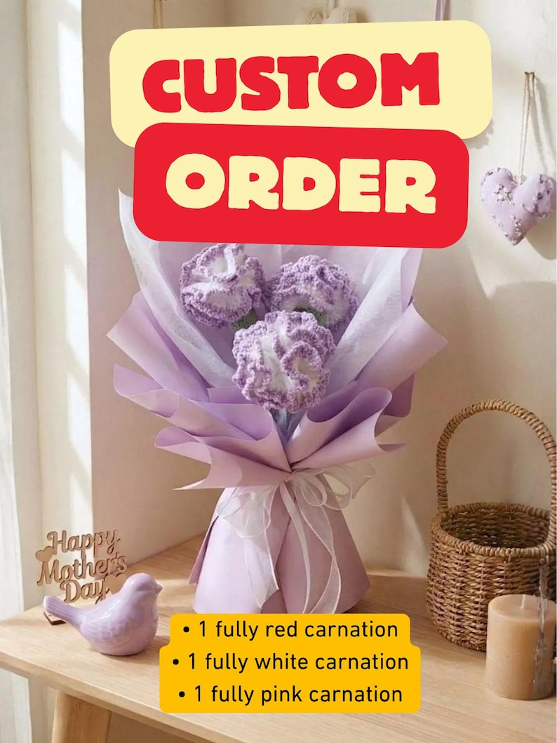 May include: A bouquet of three carnations, wrapped in lavender paper and tied with a white ribbon. The bouquet is labeled "CUSTOM ORDER" and includes a "Happy Mother's Day" message. The bouquet includes one red, one white, and one pink carnation.