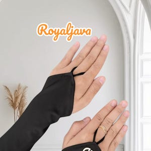 May include: A pair of black arm warmers with thumb holes. The arm warmers have a small logo on the wrist that says "HH".