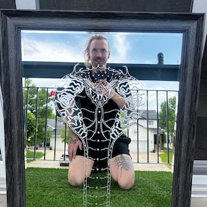 Snake engraved mirror