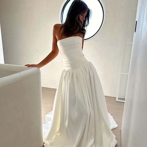 Drop Waist Strapless Satin Wedding Dress | A-line silhouette | Modern and stylish wedding dress - MELISSA