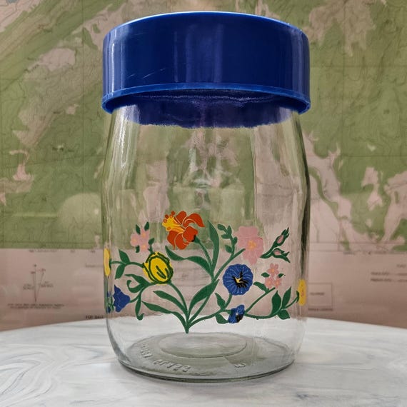 Vintage Floral Glass Jar with Blue Lid – 6.5" Tall Canister – Colorful Wildflower Print Storage Container – Retro Kitchen Pantry Decor
