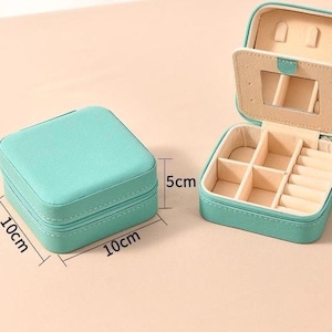 Caja de cosméticos con logotipo o patrón personalizado, portátil, para mujer, collar, anillo, material de PU, bolsa con cremallera de alta gama con tapa abatible con espejo, almacenamiento de joyas