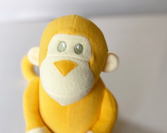 Yellow stuffed monkey discount