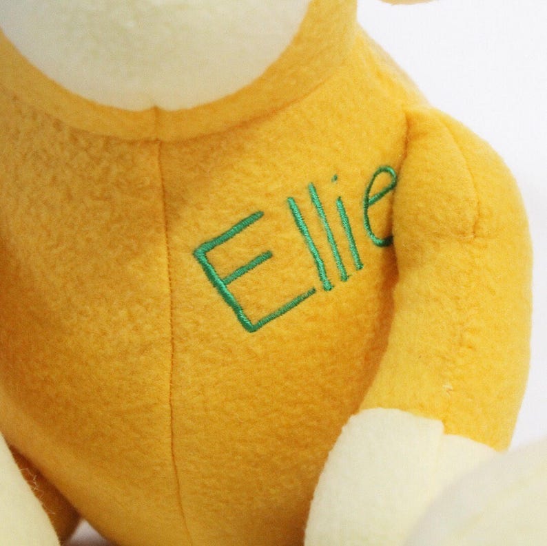 black and yellow stuffed monkey
