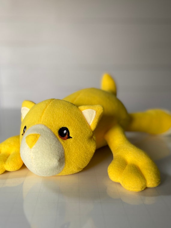 yellow stuffed cat