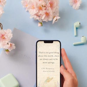 May include: A blue smartphone with a white background displaying a quote from L.M. Montgomery's Anne of Green Gables. The quote reads: "That is one good thing about this world...there are always sure to be more springs."