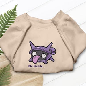 Camiseta, sudadera y sudadera con capucha bordadas con diseño de concha marina de Shellder. Regalo ideal para fans del anime.