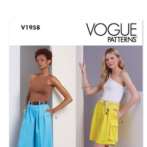 May include: Vogue Patterns sewing pattern featuring two different outfits. One outfit includes wide-leg, light blue pants with a brown top and a belt. The other outfit includes yellow shorts and a white one-shoulder top.