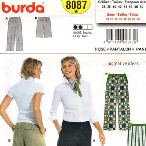 May include: A sewing pattern for pants, featuring illustrations of different styles, including wide-leg and shorts. The pattern includes the number 8087 and the Burda logo. The image also shows the sizes available.