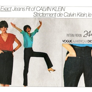 May include: A sewing pattern for jeans, featuring a woman wearing a red top and a pair of jeans, another woman wearing a blue top and a pair of jeans, and a close-up of the back of a pair of jeans. The pattern number is 2442 and the text "Vogue American Designer" is also included.