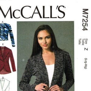 May include: McCall's sewing pattern M7254 featuring a woman wearing a black and white textured jacket. The pattern includes illustrations of various jacket styles, including a blue and white patterned jacket, a red jacket, and a vest.