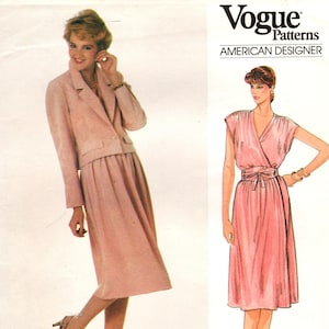 May include: Vogue Patterns sewing pattern featuring designs by Adele Simpson. The cover shows a woman in a pink suit and another in a pink wrap dress. The text "Vogue Patterns" and "American Designer" are displayed at the top. The pattern number is 2920.