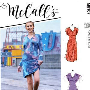 May include: McCall's sewing pattern M8107. The image shows a woman wearing a tie-dye dress, and illustrations of two other dress styles. The pattern includes multiple view options with simple instructions. The hashtag #MaybelMcCalls is included.