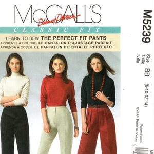 May include: McCall's Classic Fit sewing pattern for pants, size BB (8-10-12-14). The pattern includes three different styles of pants: black, beige, and red.