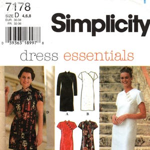 May include: Simplicity dress pattern featuring various dress styles. The image shows a black dress, a white dress, a red dress, and a black and red patterned dress. The pattern also includes black pants. The text "dress essentials" is visible.