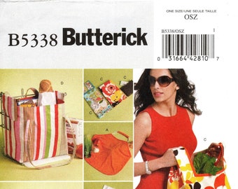 May include: A sewing pattern for making different types of reusable shopping bags. The pattern includes instructions for making a tote bag, a drawstring bag, a grocery bag, and a cooler bag. The pattern is from Butterick and has the number B5338/OSZ.