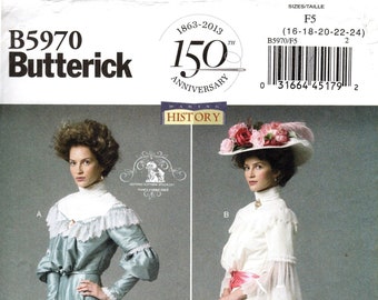 May include: A vintage sewing pattern for a long dress with a lace trim. The pattern is for sizes 16-18-20-22-24 and is from Butterick pattern number B5970. The pattern is for a dress with a high neck and long sleeves. The dress is shown in two different colors, a light blue and a white.