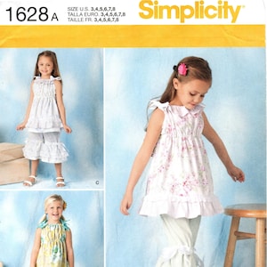 Maat 3 t/m 8 - eenvoudspatroon 1628 van TENDERFEET STITCHES - jurk met verhoogde taille voor kinderen/meisjes met strikbandjes of topje en broek met ruches aan de pijpen