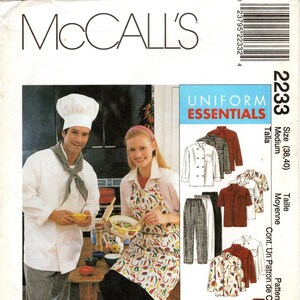 May include: A sewing pattern for a uniform, featuring a chef's hat, a white chef's jacket, black trousers, a red apron, and a white shirt with a red and white pattern. The pattern is for sizes 38 and 40. The text on the pattern reads "Uniform Essentials".