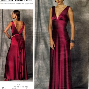 May include: A Tom and Linda Platt Vogue Patterns American Designer sewing pattern envelope for a floor-length, sleeveless, deep magenta gown with a V-neckline, a fitted bodice, and a draped back detail. The pattern number is V1474, size C5.