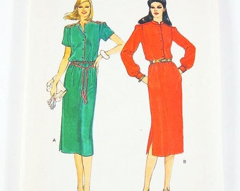 May include: Vogue Patterns sewing pattern number 7426 for a dress. The pattern shows two women wearing the dress in different colors: green and orange. The pattern is for size 12 and costs $3.50.