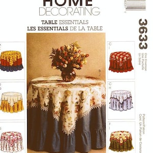 May include: A sewing pattern for table linens, featuring a floral tablecloth, a red and white checkered tablecloth, a blue and white striped tablecloth, and a green and white tablecloth. The pattern includes instructions for making a tablecloth, placemats, and napkins.