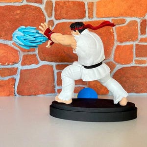 Figura de Street Fighter Ryu, estatua de Ryu Attache de 25 cm, figura de videojuego, regalo para gamer, juego de lucha retro.