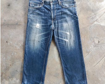 Jeans vintage Edwin Brand, rotos y descoloridos, cintura japonesa vintage, talla 39