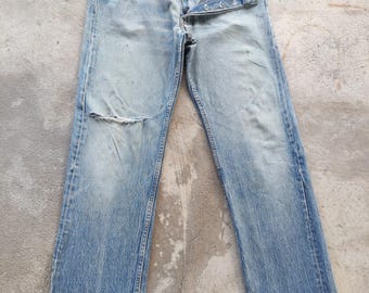 Jeans Levi's 501 vintage japoneses con botones, de mezclilla desgastada y desteñida, talla 34.