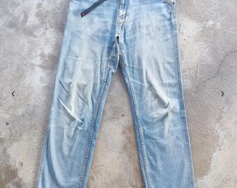 Pantalones vaqueros desgastados y rotos de la marca Gramicci vintage, cintura 34