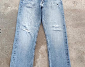 Vaqueros desgastados y descoloridos vintage de Lee Japan, cintura japonesa vintage 32