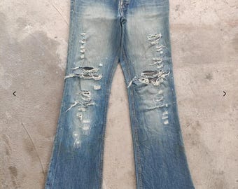 Vaqueros vintage japoneses acampanados, desgastados y desteñidos, corte bota, cintura 34.