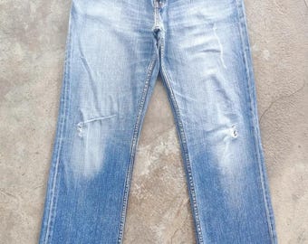 Pantalones vaqueros descoloridos Levi's Japan Distress vintage, cintura japonesa 34