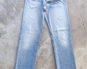Pantalones Levi's vintage con botones desgastados y descoloridos, cintura japonesa vintage 29