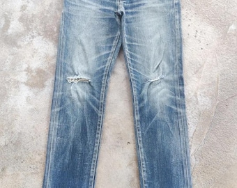 Pantalones vaqueros desgastados de marca japonesa vintage, cintura 31