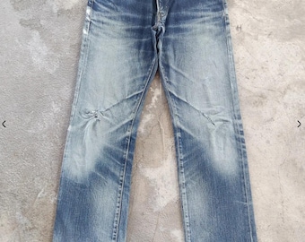Pantalones vaqueros desgastados con número en la espalda vintage, cintura japonesa vintage 33