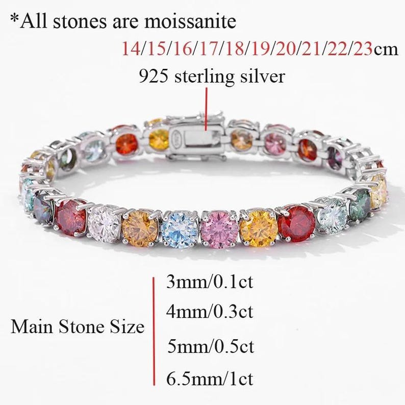 May include: A silver bracelet with a variety of colorful moissanite stones. The bracelet is made of 925 sterling silver and features stones ranging from 3mm to 6.5mm in size. The text on the image says "All stones are moissanite."