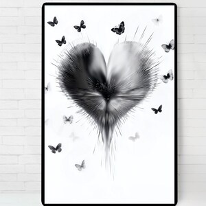 May include: Black and white art print featuring a stylized heart shape with radiating lines. Several butterflies in varying shades of gray and black are scattered around the heart, creating a dynamic composition. The artwork is framed in a black border.