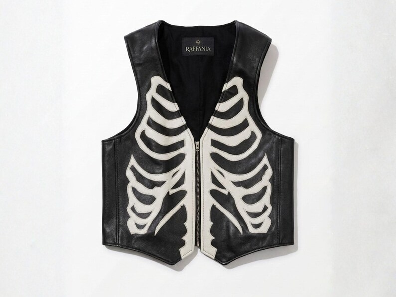 Front view of Raffania skeleton leather vest with white bone applique and YKK zipper closure.
