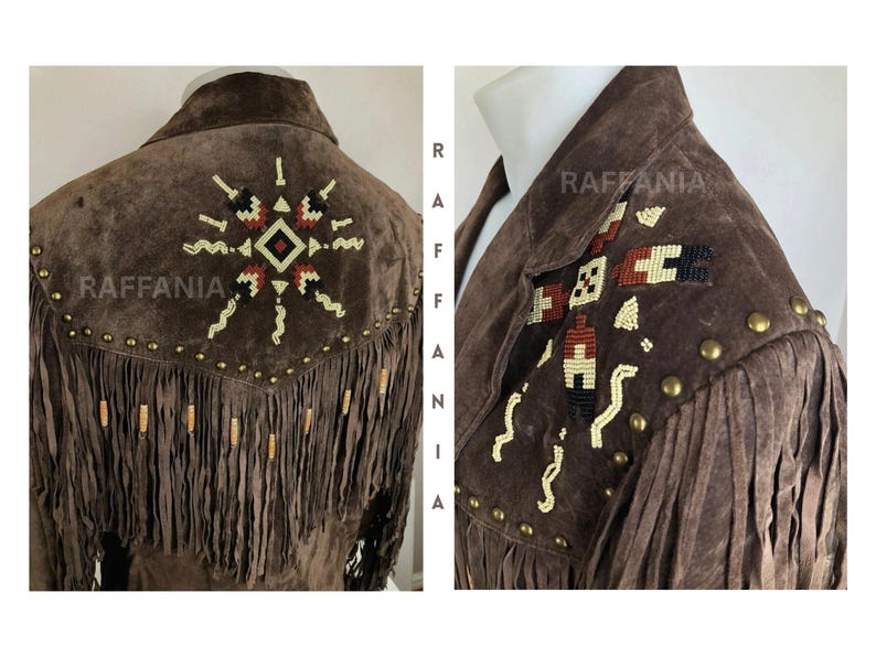 May include: A brown suede jacket featuring long fringe detailing along the back and shoulder yoke. The garment is adorned with intricate geometric beadwork in cream, red, and black, accented by a row of metallic studs along the yoke seam.