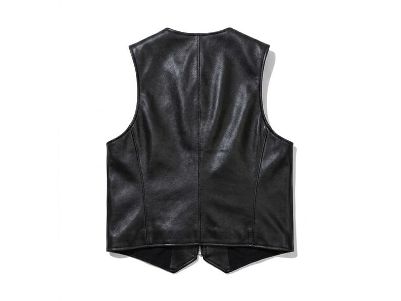 Back view of a minimalist plain black leather vest with premium stitching and tailored fit.