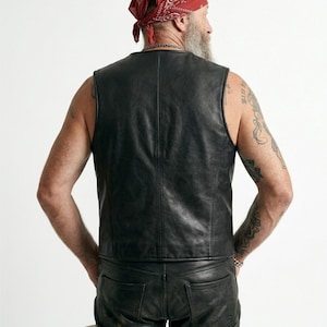 Handmade Raffania skeleton leather vest for men featuring a white ribcage bone design on premium black genuine cowhide leather.