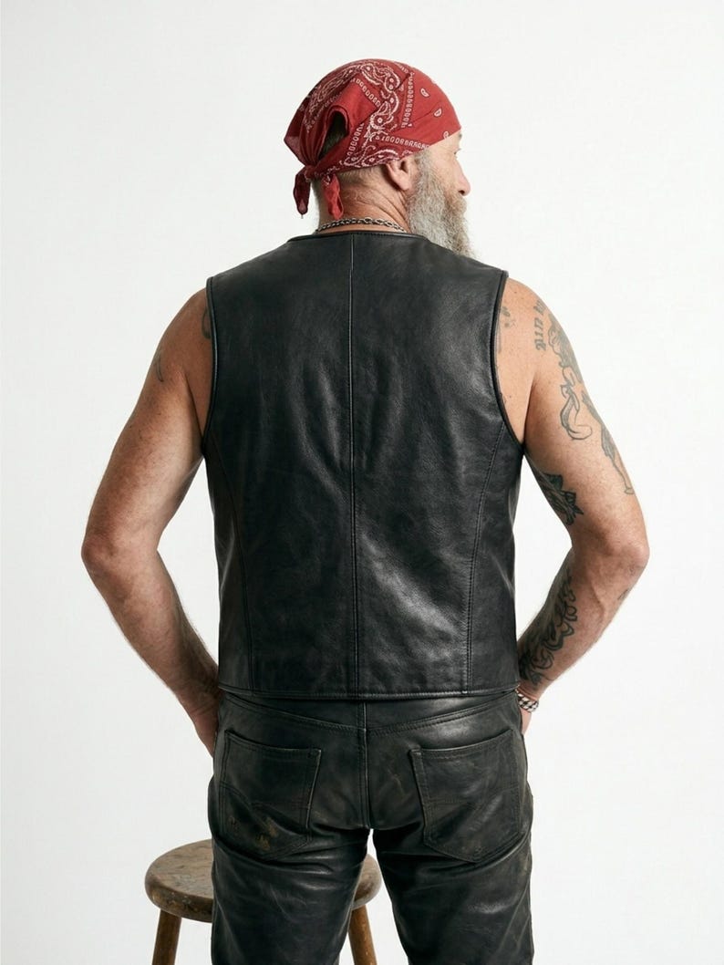 Handmade Raffania skeleton leather vest for men featuring a white ribcage bone design on premium black genuine cowhide leather.