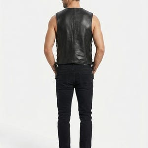 Handmade Raffania skeleton leather vest for men featuring a white ribcage bone design on premium black genuine cowhide leather.