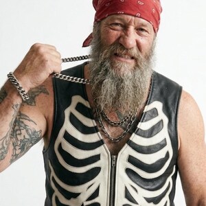 Handmade Raffania skeleton leather vest for men featuring a white ribcage bone design on premium black genuine cowhide leather.