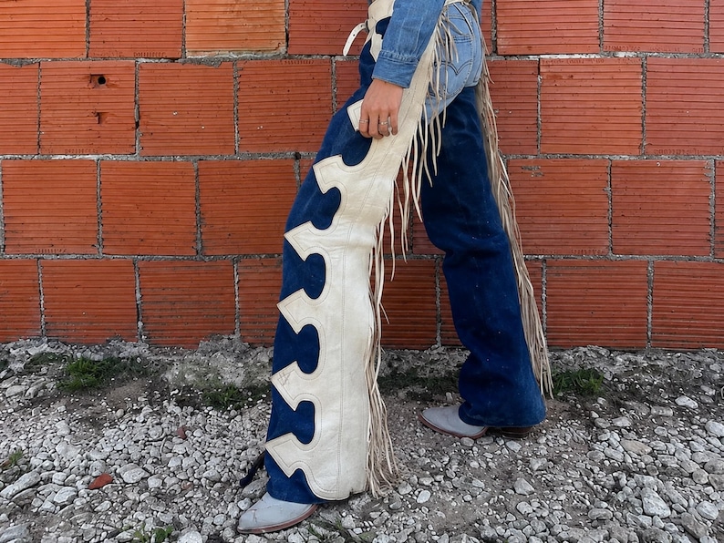 Handmade blue and ivory western leather chaps with long fringe for women, authentic cowboy riding chaps and rodeo wear.