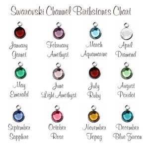 May include: Chart showing Swarovski birthstones for each month of the year. The chart features a small crystal charm for each month, with the month and birthstone name listed below each charm.