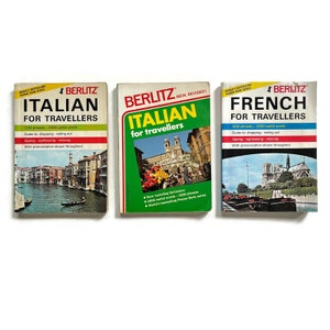 May include: Three Berlitz language phrase books for travelers. The books are green and red with white text. The books are for Italian, Italian, and French. The books feature images of Venice, Rome, and Paris.