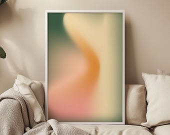 May include: Abstract art print with a blurred, swirling design in shades of green, orange, and pink. The print is framed in a white frame.